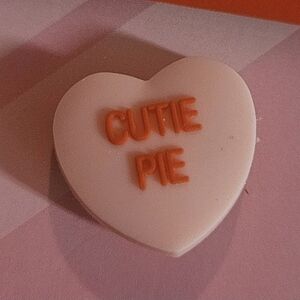 CROCS Pink Heart Jibbitz Charm with Orange "CUTIE PIE" Text